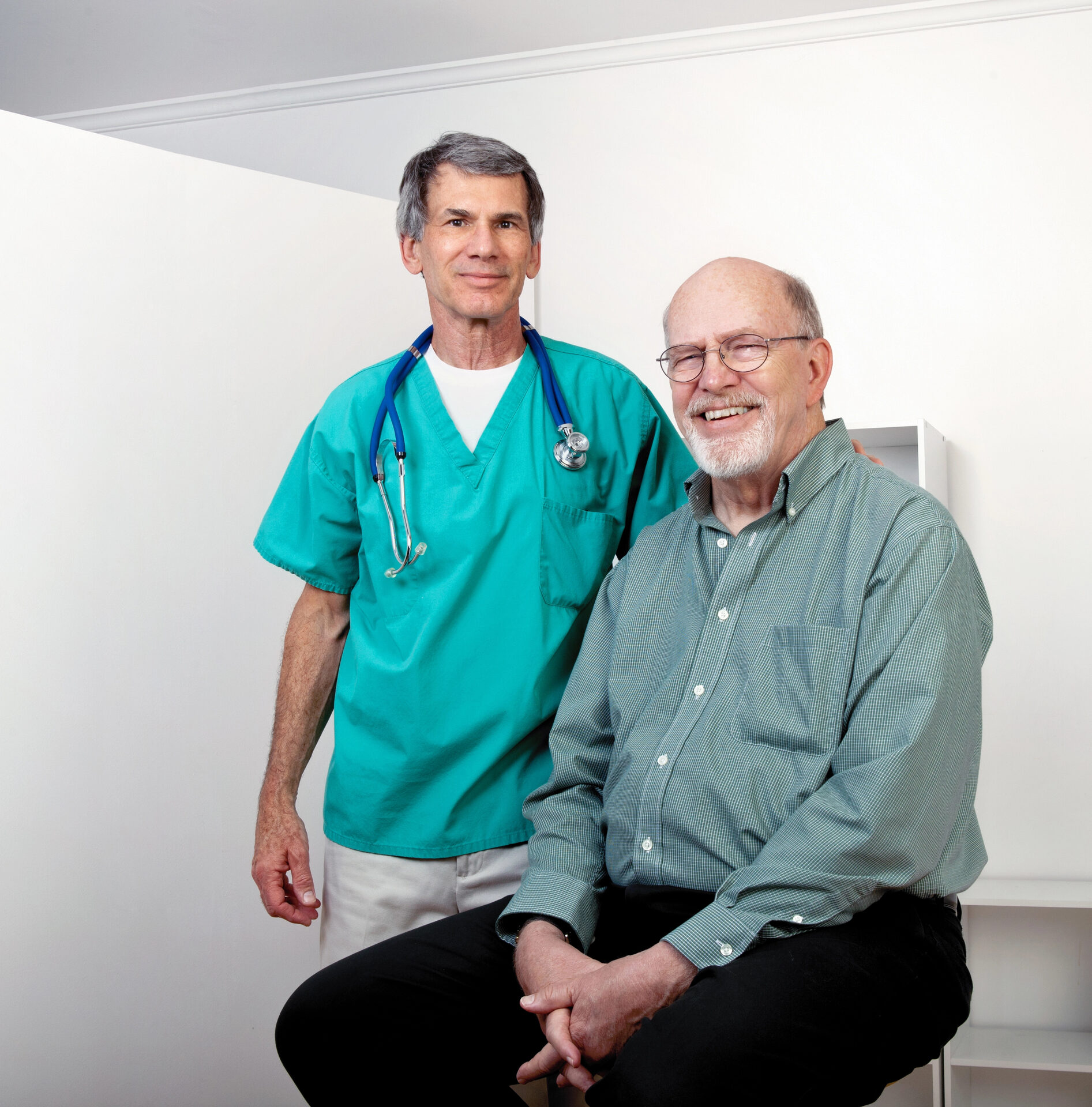 Compassionate doctor with senior patient at Epione Pain Center
