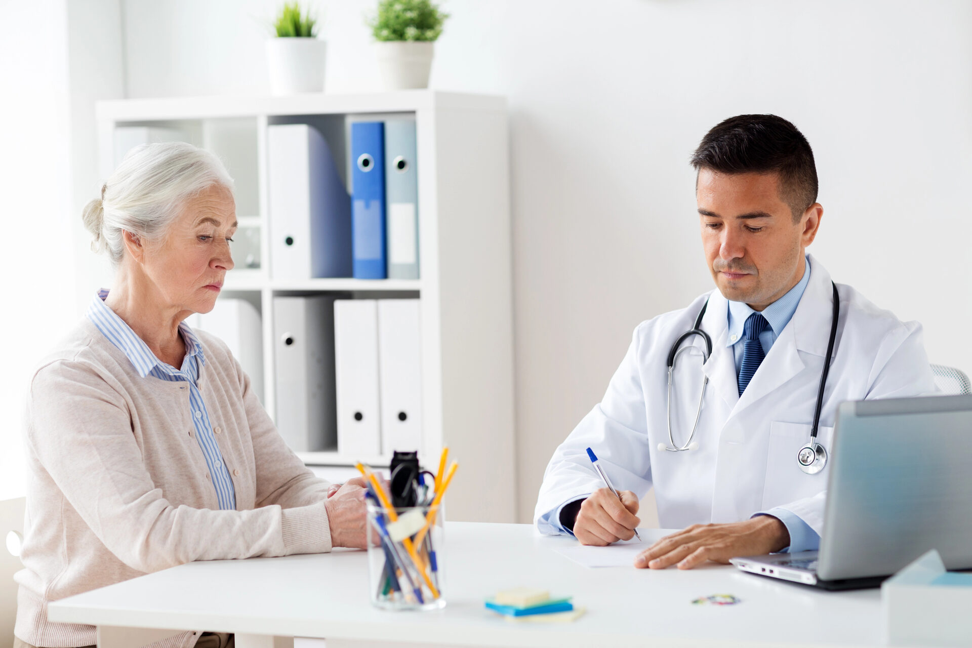 Physician reviewing a referral with a patient